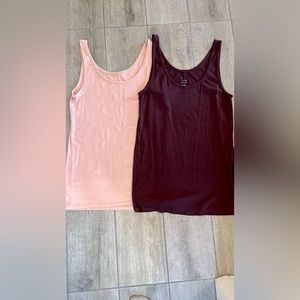 2 a new day tanks in pale pink and rich Burgundy. Excellent condition!
